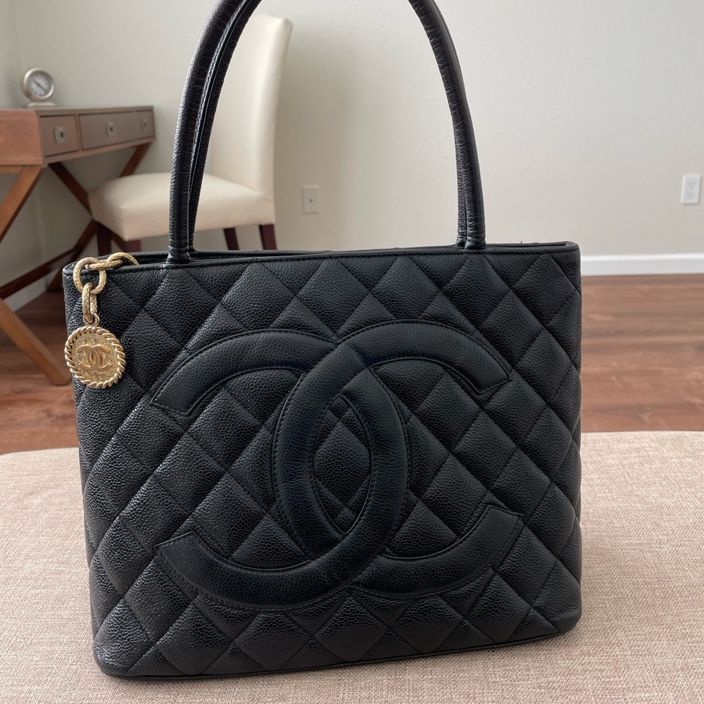 Black Chanel caviar medallion tote